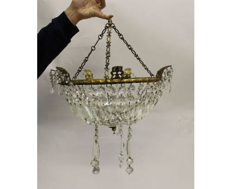 A pair of gilt metal ceiling lamp shades, the circular frame suspending glass lustre's and droplets