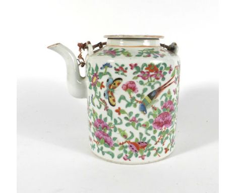 An early 20th century Cantonese teapot and cover of cylindrical form, typically decorated in coloured enamels with birds and 