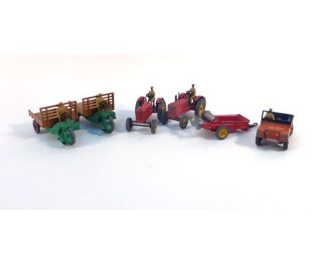 A group of playworn post war Dinky models consisting:27A Massey-Harris Tractor 'A',27A Massey-Harris Tractor 'B',27C Manure S