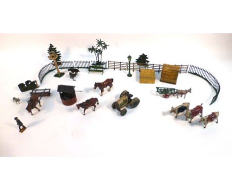 An American Animate Toy tinplate 'Baby Tractor', together with a mixed group of Britains and other lead figures and accessori