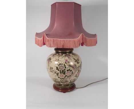 A modern Satsuma table lamp decorated with wisteria and flowering shrubs on a cream ground, h. including shade 83 cm   CONDIT