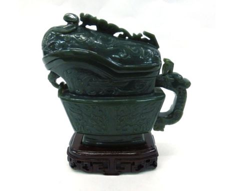 A modern Chinese faux jade carving in the form of an archaic gong on stand, h. 24 cm   CONDITION REPORT:  No obvious chips, c