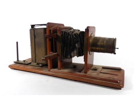 A Victorian brass and mahogany mounted magic lantern/slide projector, l 63 cm