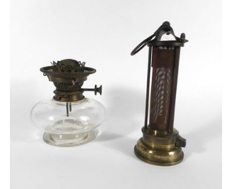 A Thomas & Williams light together with a part oil lamp
