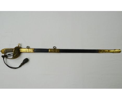 A lion's head Victorian naval officer's sword with scabbard retailed by Matthews & Co. Portsmouth 