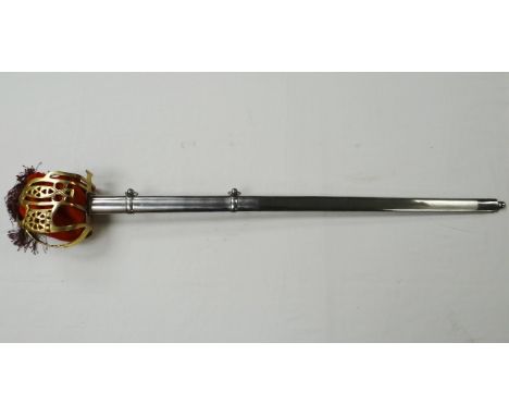 A reproduction Scottish basket hilt sword in scabbard 