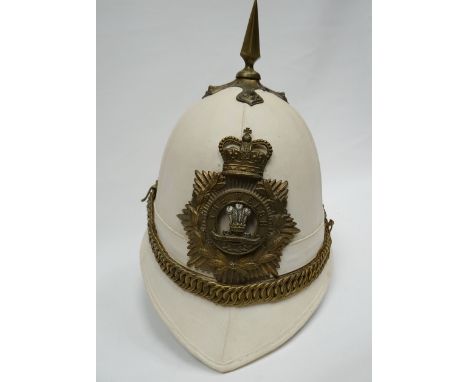 A tropical white helmet with plate for 'The Welsh' with fittings 