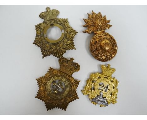 Four regimental helmet plates 