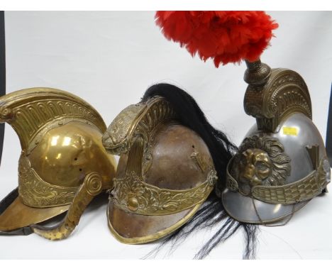 Three continental helmets to include French Cuirassier's and Fire Service helmet 