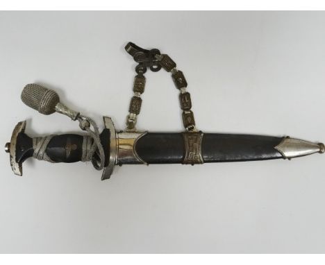 A German Third Reich Nazi SS Officers dagger with SS logo and skull engraved chain scabbard hanger and silver portepee knot, 