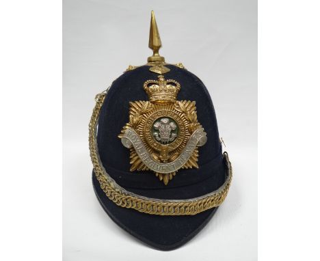 A Royal Regiment of Wales bandsman's blue cloth helmet 