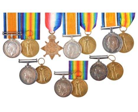 A small collection of Great War Medal Groups, comprising: a 1914-15 Star trio (8384/8308 PTE./CPL. E. MATTHEWS. DORSET. R.); 