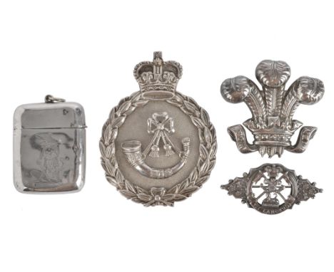 12th Royal Lancers: three silver items: an officer's belt ornament, Prince of Wales' Feathers, converted for use as a brooch,