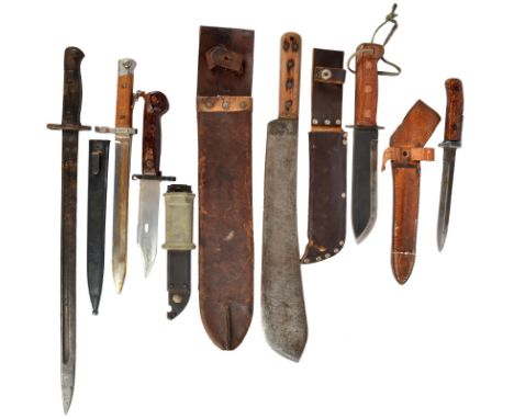 A collection of edged weapons, comprising: an AKM type 1 bayonet, an Austrian M1895 Mannlicher bayonet, a Czech VZ-58 bayonet