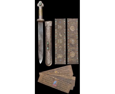 A Tibetan dagger, single edged blade 11.5 in., white metal clad hilt with trefoil terminal set with a turquoise cabochon to a