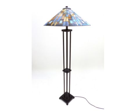 In the manner of Tiffany, standard lamp with lead lined glass of geometric patterns, four box support, overall 160cm h