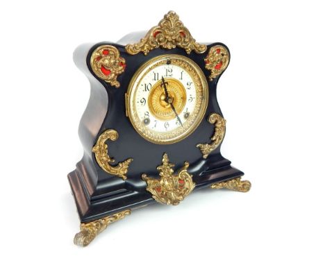 Ansonia mantel clock in rococo influence case, shaped metal case with applied scroll and floral decoration, brass movement st