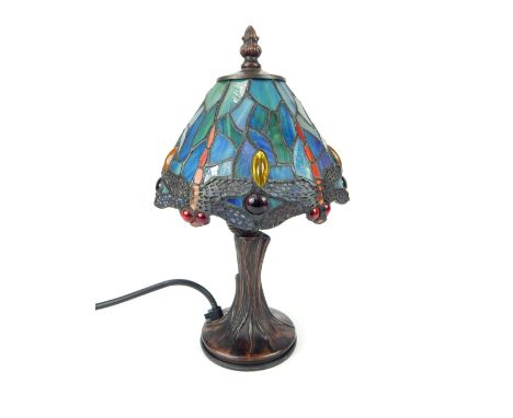 In the manner of Tiffany, table lamp with dragonfly glass and metal shade, tree form base, overall 31cm h