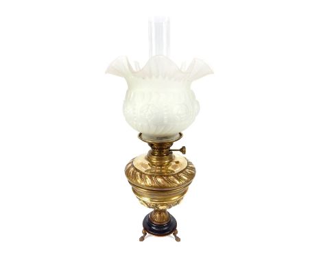 Late 19th C brass and glass French oil lamp, opaque frill shade with rose decoration, repousse leaf decoration to body, set o