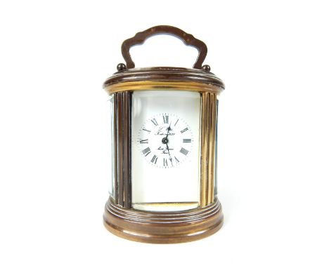 French miniature oval carriage clock, the cream dial with Roman numerals, 11 jewels, signed L'Epee 1839, made in France to re