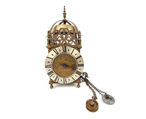 In the manner of Thomas Moore of Ipswich, a lantern clock, chain driven movement striking on a bell, 37 x 19 x 19cm