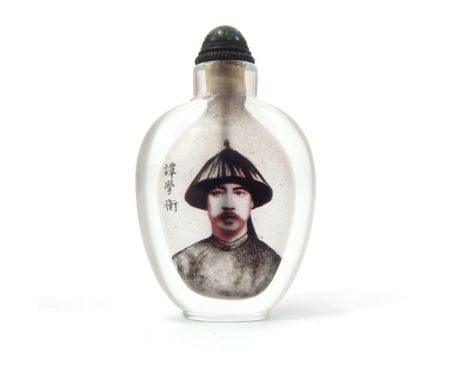 Chinese glass snuff bottle, head and shoulder portrait to one side and script to other, cloisonne stopper, 8cm h