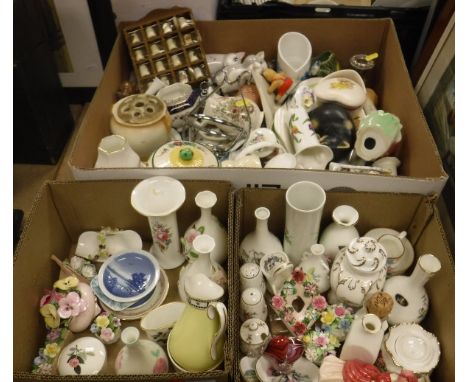 A selection of various china wares to include a Poole figure of a seated bear, pair of Coalport vases with floral encrusted d