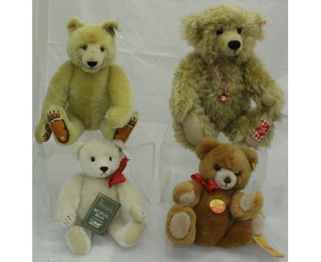 A Steiff "1985" bear, a Steiff musical bear, limited edition of 2000 for Harrods and a Steiff "Petsy" bear, all with button i