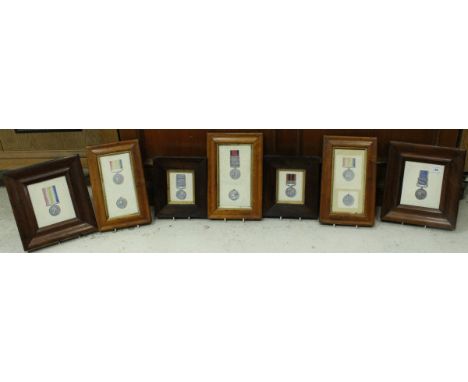 A collection of seven framed and glazed hand-painted studies of medals including Crimea medal, Jellalabad (x 2), Peninsula Wa