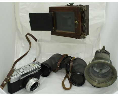 A mahogany cased Bellows Plate camera (incomplete), a Vest Pocket Autographic Kodak camera, together with pouch and instructi