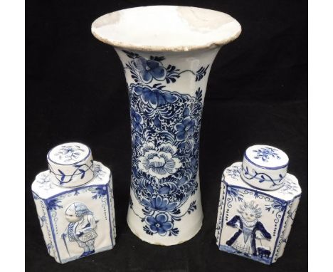 Two Delft blue and white tea caddies, each decorated with woman and dog and gentleman and walking stick verso, differing make