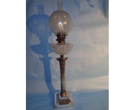 A fine Victorian gas lamp with a silver plated Corinthian column designed stem, an etched glass shade, a cut glass font and a