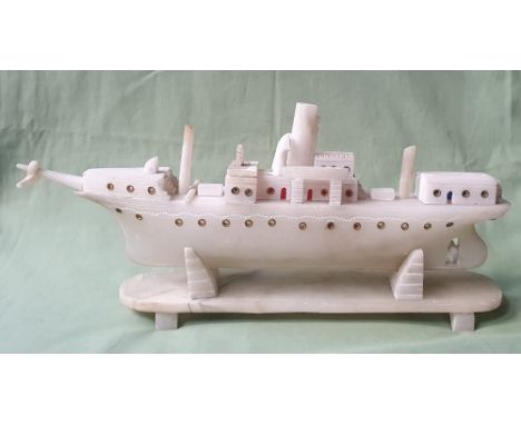 An alabaster model of a small steam liner, 16" across.