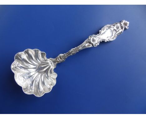 An art nouveau Sterling silver sauce ladle, 7.25".