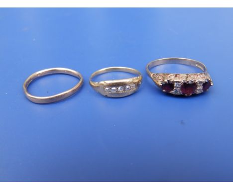 A diamond set ring and two 9ct rings. (3)