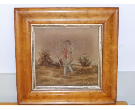 A Georgian woolwork panel on silk, depicting a farm labourer carrying his tools, 9" x 9.5" in maple frame.