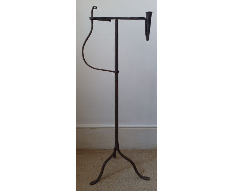 A wrought iron candle holder &amp; rush light, 12.5" high