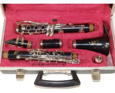 A cased Boosey &amp; Hawkes Regent 300 clarinet, approximately 27".