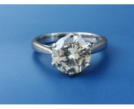 A diamond solitaire ring, the claw set brilliant weighing approximately 2.4 carats on platinum shank.  Finger size L/M.