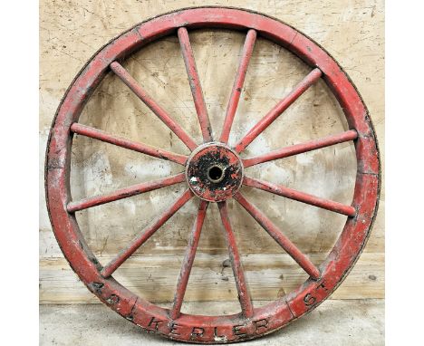 Vintage wooden/metal cart wheel with carved '42 Kepler St. Approx. 93cms D
used with wear due to age etc