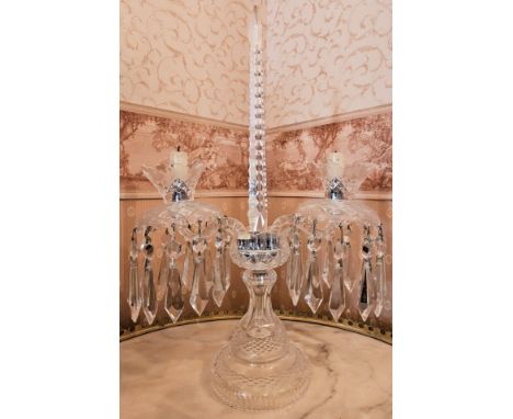 Pretty cut glass two sconce candle stand with central obelisk and droplets to either side. Approx. 50cms H
reasonable used co