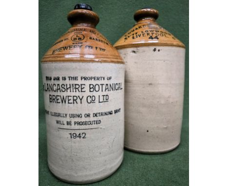 Two vintage loop handled advertising stoneware flagons. Largest Approx. 33cms H
both used with wear etc