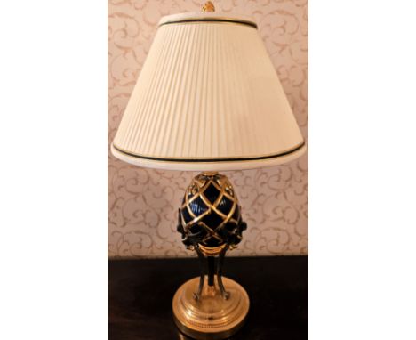 "The Faberge Imperial Egg" gilt metal table lamp, by Franklin Mint. Approx. 56cms H
reasonable used condition not tested