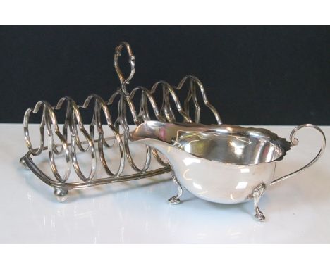 Early 20th century silver toast rack, hallmarked G Brace &amp; Co Ltd, London, 1912 together with a silver jug, hallmarked He