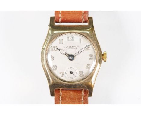 J W Benson 9ct gold vintage wrist watch. The watch having silver dial with arabic numerals to the chapter ring and subsidiary