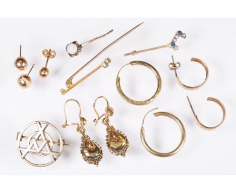 Collection of assorted yellow metal jewellery findings to include stud earrings, hoop earrings, brooch fragments etc. One ear