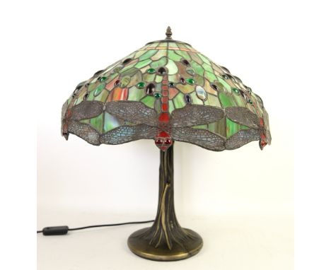 Tiffany style table lamp with dragonfly decoration.