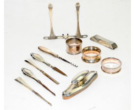 Selection of silver items including napkin rings, manicure stand and tools 