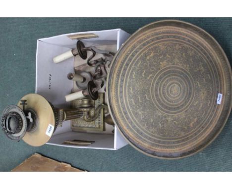 A collection of brass ware, shell chamber stick and Indian tray.