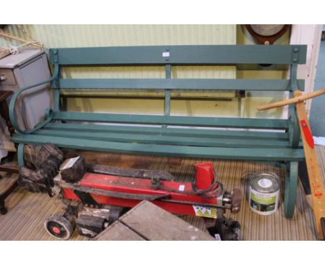 A metal framed green painted slatted garden bench